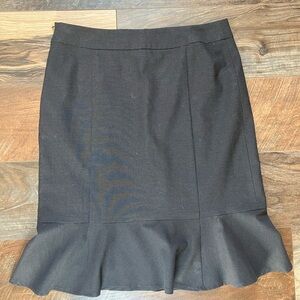 Brown pencil skirt with ruffle. Really nice quality and in perfect condition!